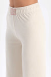 Ekru Etiket Detaylı Bol Paça Kadife Pantolon